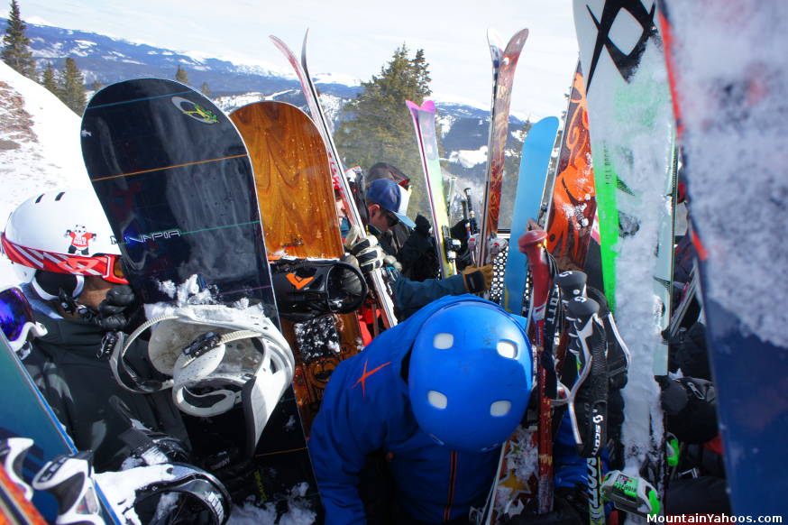 Snowcat riders are packed in for the journey