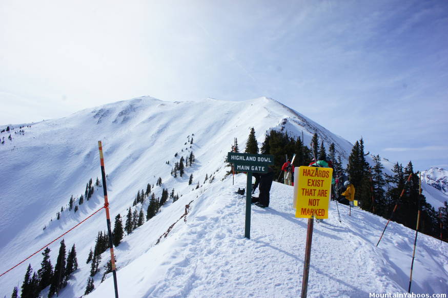 Snowcat riders are packed in for the journey