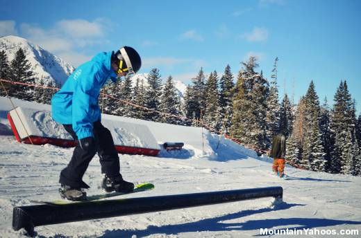 Skier riding rails