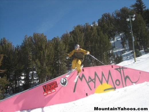 Skier riding rails