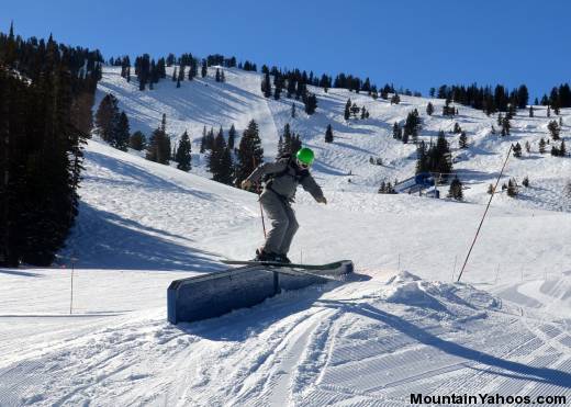 Skier riding rails